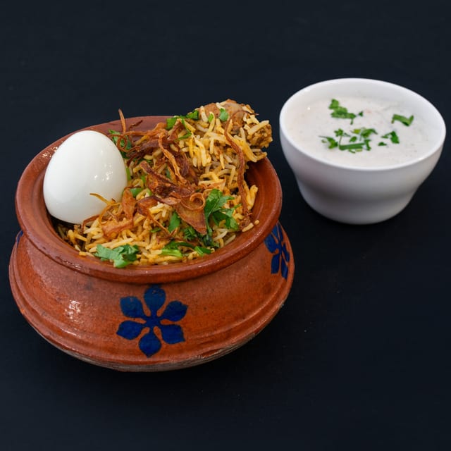 Hyderabadi Chicken Dum Biryani.
