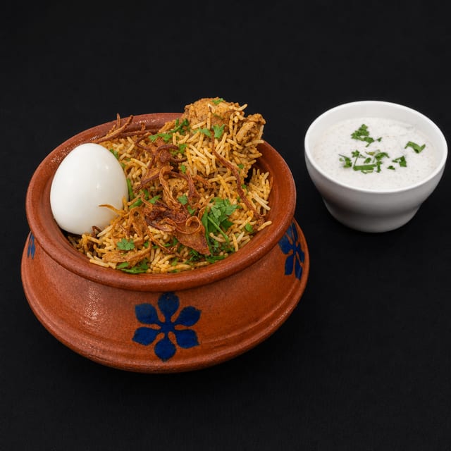 Hyderabadi Chicken Dum Biryani.