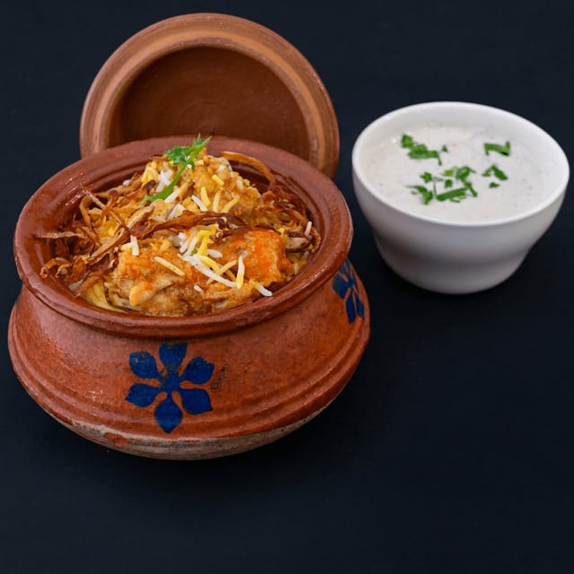 Dum Pukht Chicken Biryani.