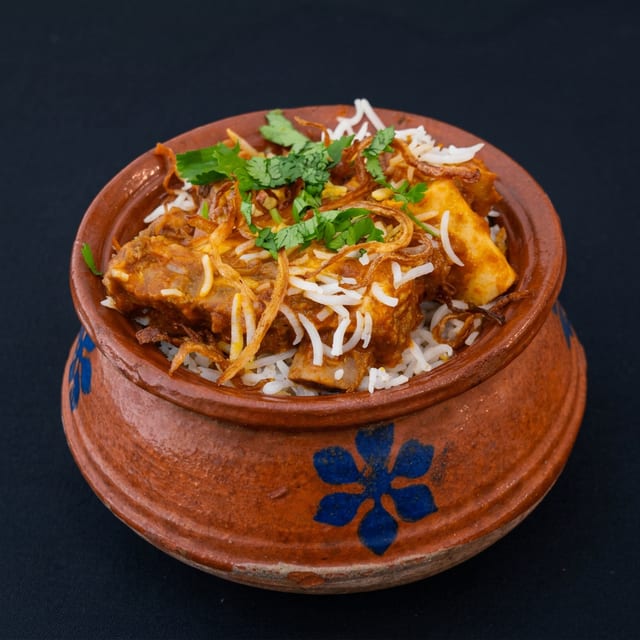 Dum Pukht Goat Biryani.